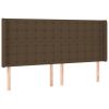 Hoofdbord met randen 183x16x118/128 cm stof donkerbruin