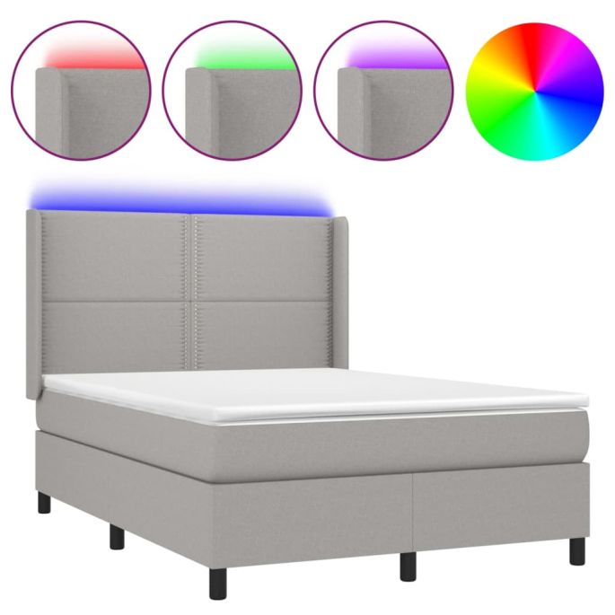 Boxspring met matras en LED stof lichtgrijs 140x200 cm